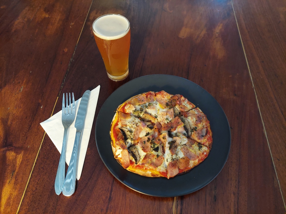 Brekky Pizza and a beer