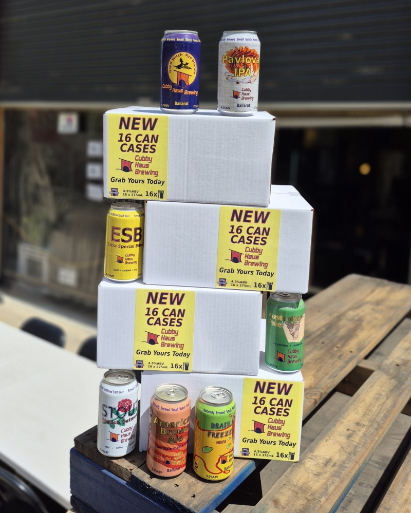 A stack of white 16 can cases labelled "New 16 Can Cases"
