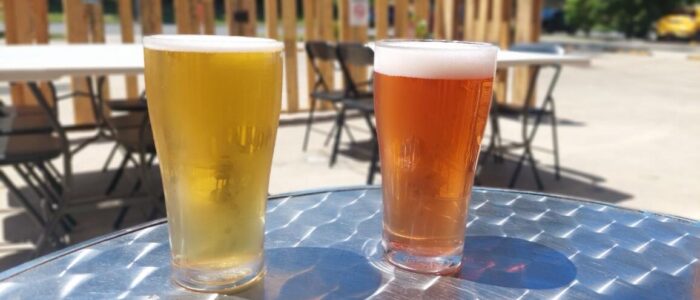 2 beers outside on a sunny day
