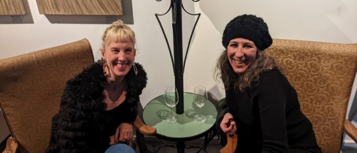 ladies with a lamp and wine