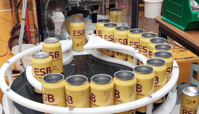 esb cans on canning machine carousel