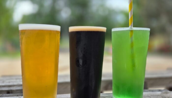 3 drinks outside; light, dark & green seltzer