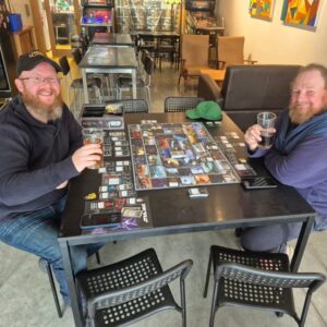 board game and beer Two guys playing a board game with Cubby Haus beers in hand